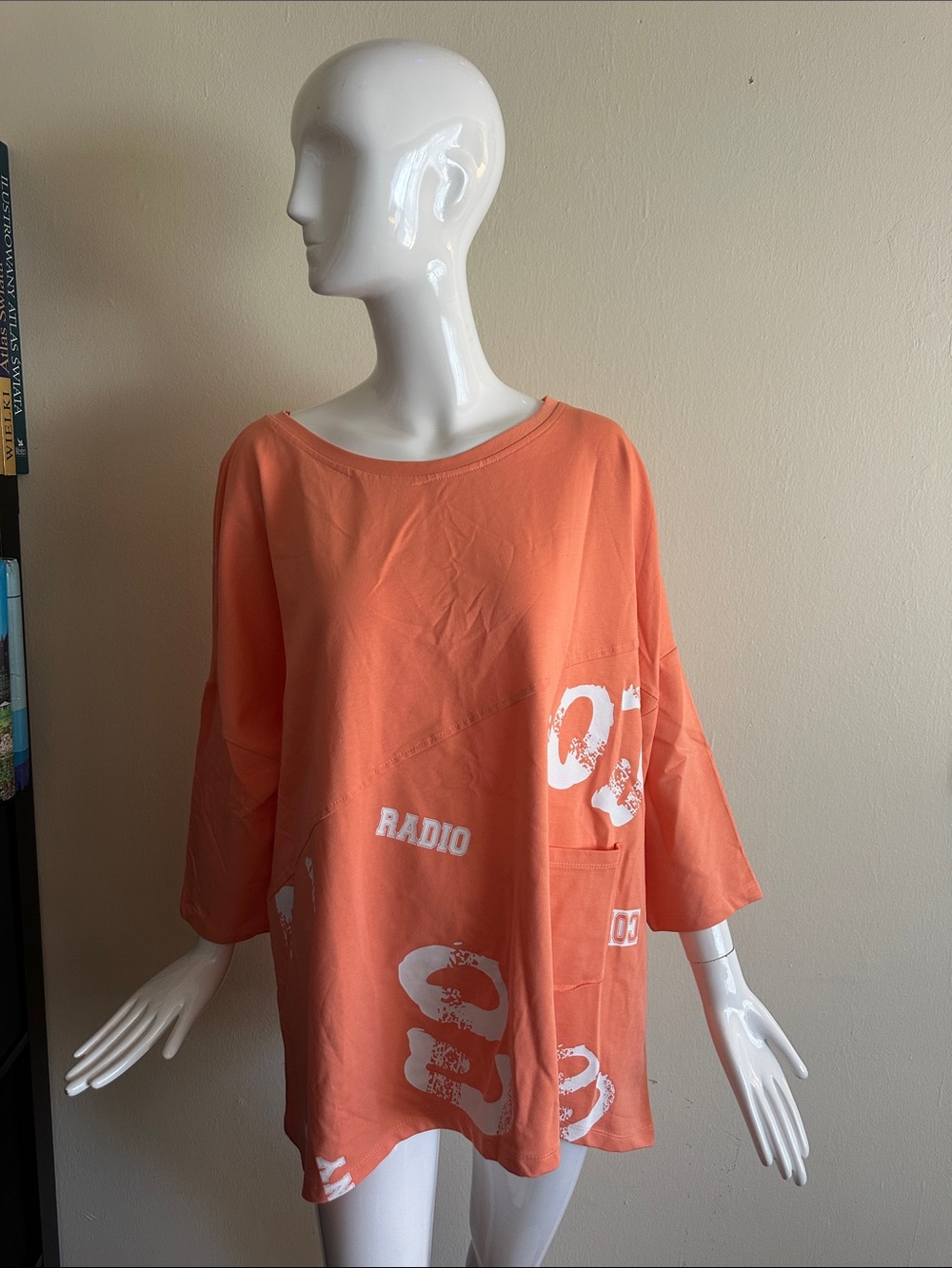 Women’s Coral Graphic Radio Pullover Top